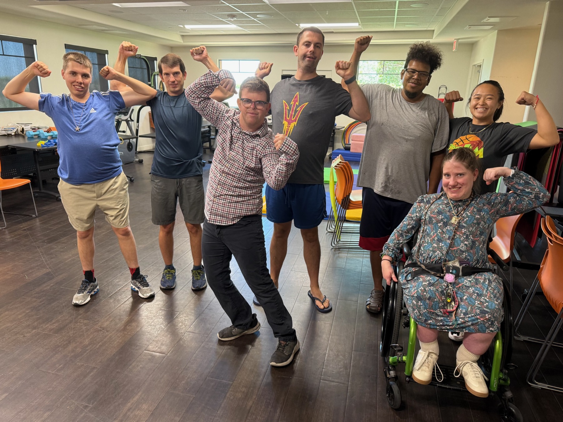 Residents and staff in the Treasure House fitness room