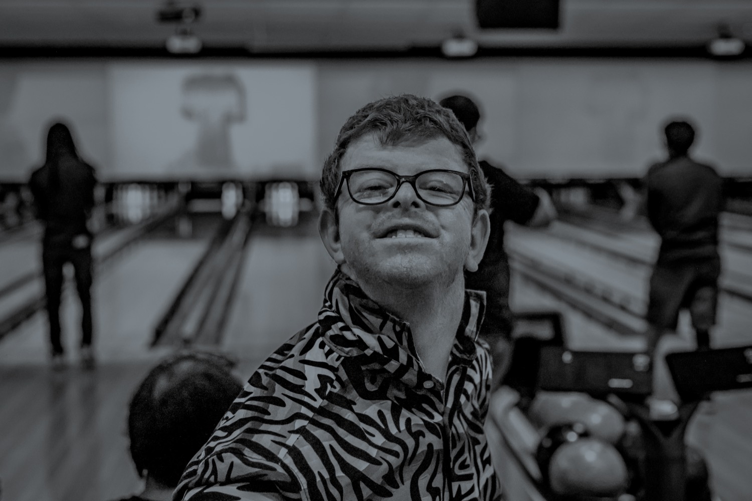 A resident at a community bowling night